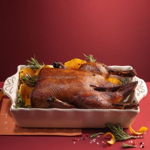 Качка запечена в апельсинах