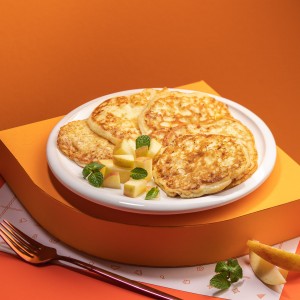 Оладки сирні з яблуками